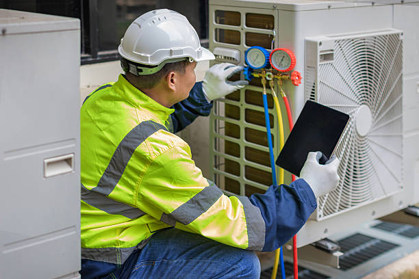 Professional Air Conditioning Repair technician working in Cortland, OH
